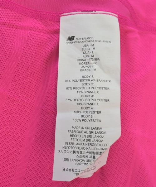 New Balance เสื้อยืด/เสื้อท็อปส์