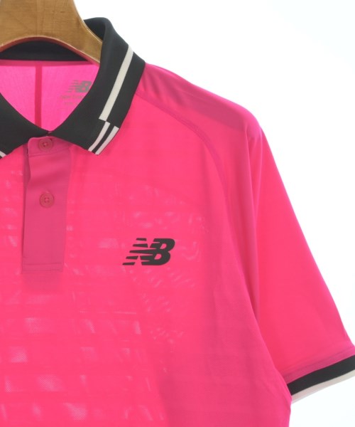 New Balance เสื้อยืด/เสื้อท็อปส์