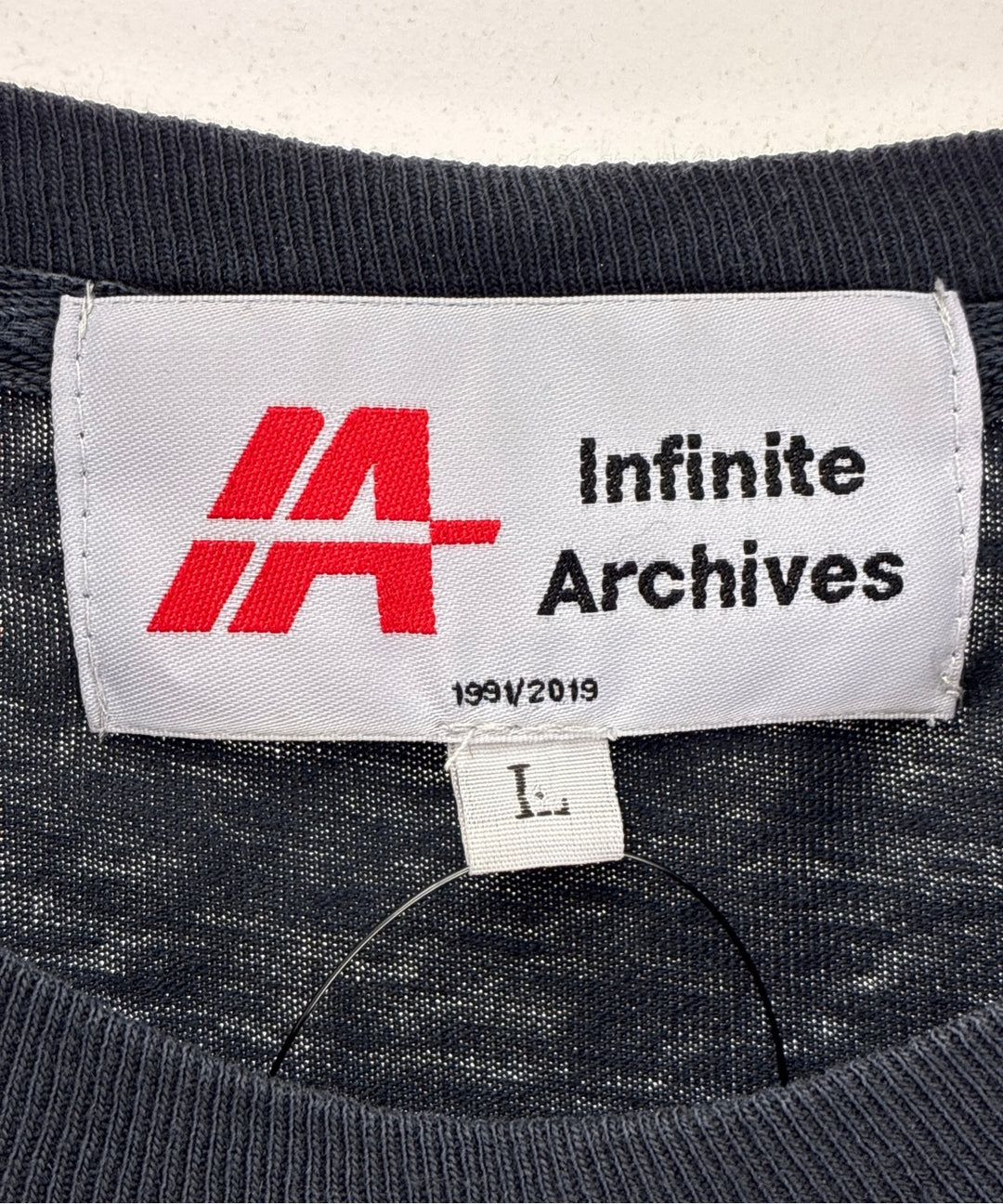 Infinite Archives เสื้อยืด/เสื้อท็อปส์