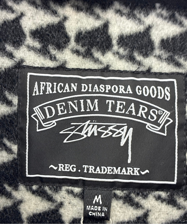DENIM TEARS เสื้อโค้ทดัฟเฟิล