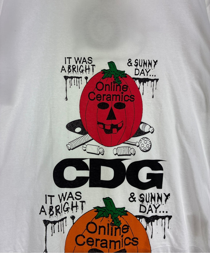 CDG เสื้อยืด/เสื้อท็อปส์
