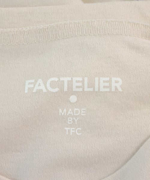 Factelier เสื้อยืด/เสื้อท็อปส์