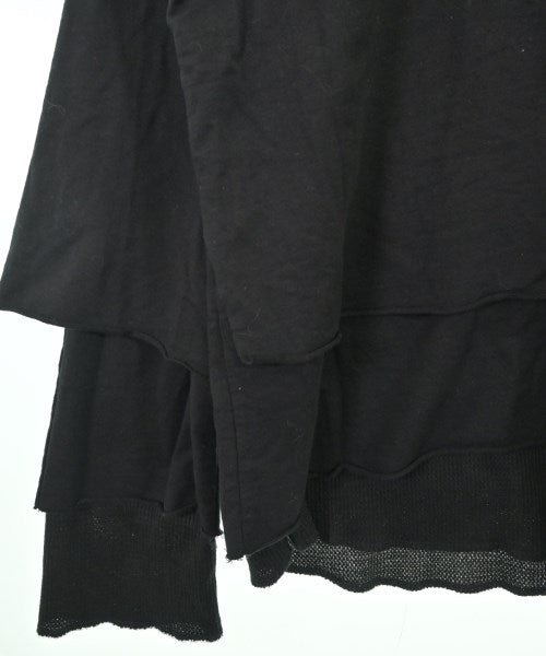 KOOI เสื้อยืด/เสื้อท็อปส์