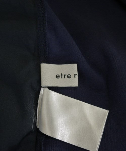 etre relie เสื้อยืด/เสื้อท็อปส์