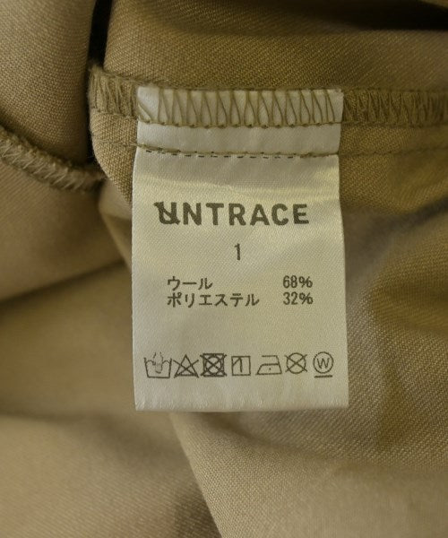 UNTRACE เสื้อยืด/เสื้อท็อปส์