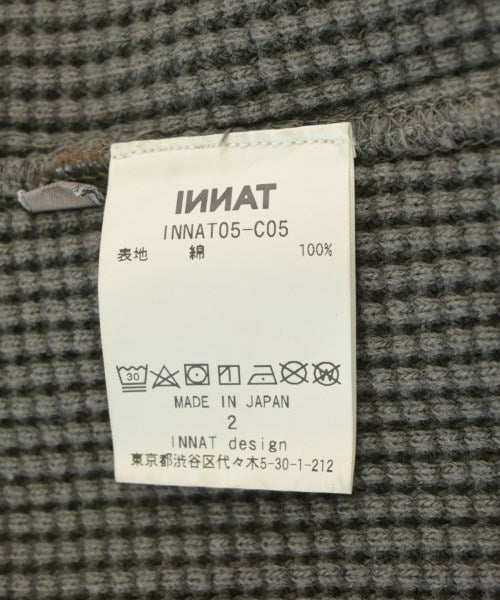 INNAT เสื้อยืด/เสื้อท็อปส์
