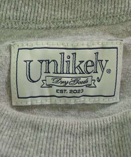 Unlikely เสื้อยืด/เสื้อท็อปส์