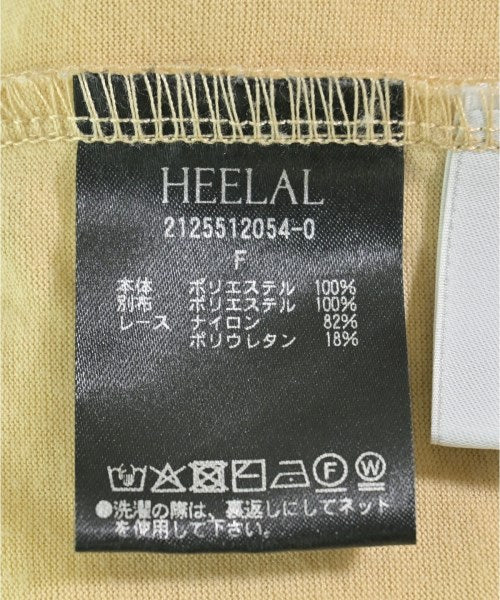 HEELAL เสื้อยืด/เสื้อท็อปส์